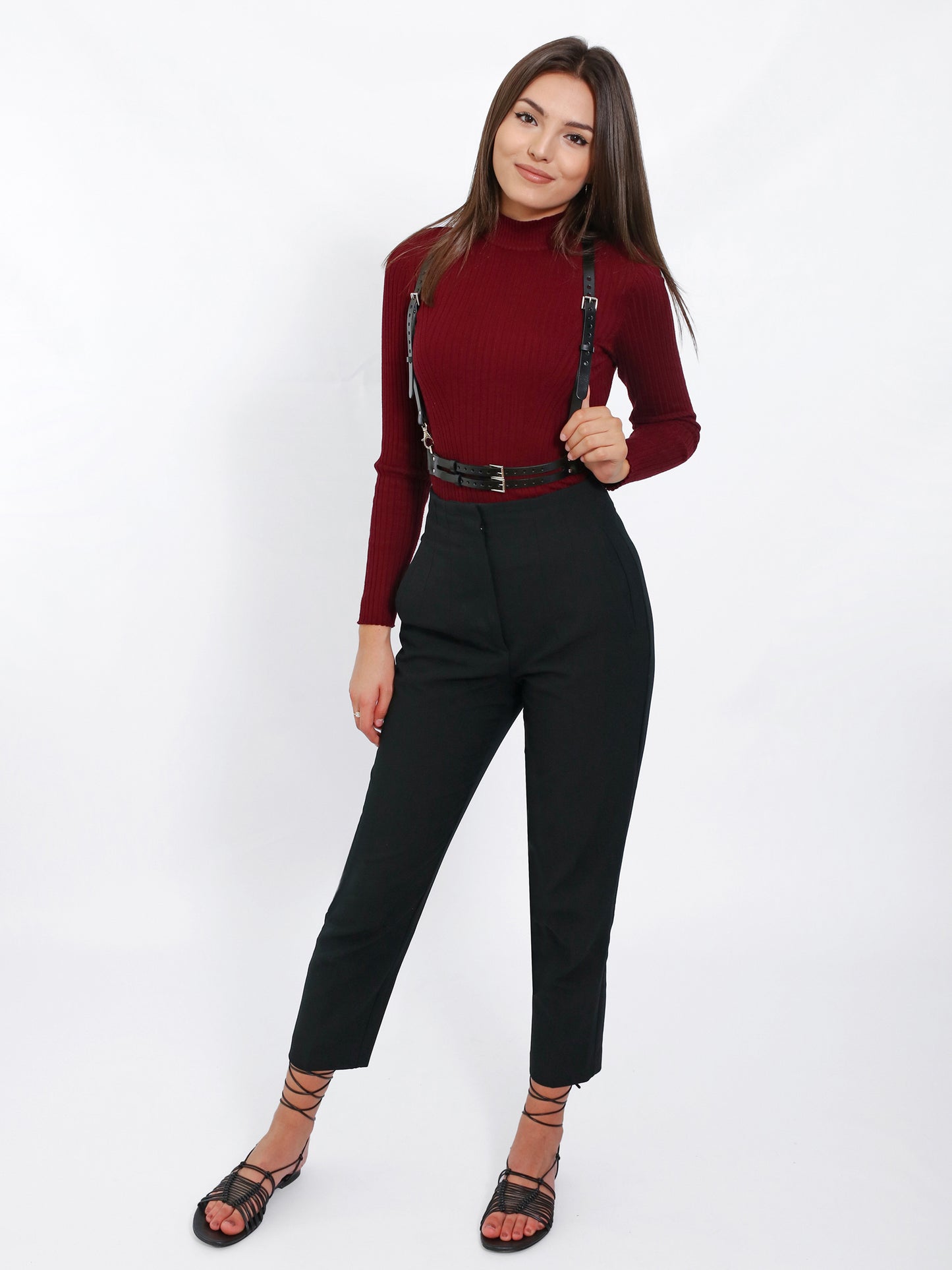 Full casual outfit where the leather suspender harness is worn.