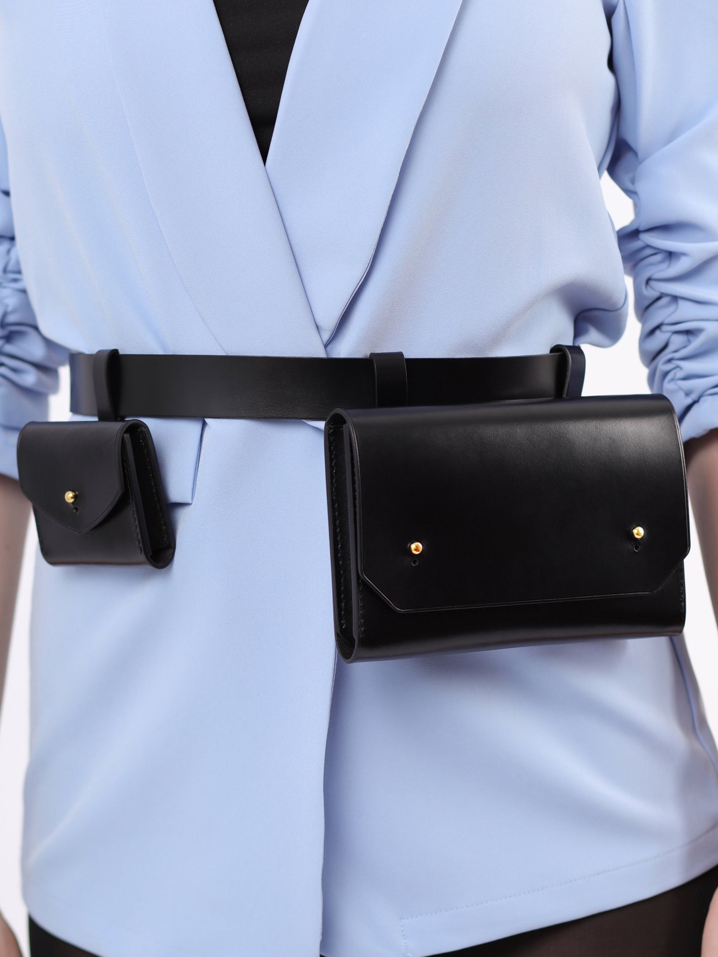Detailed view of double belt bag.