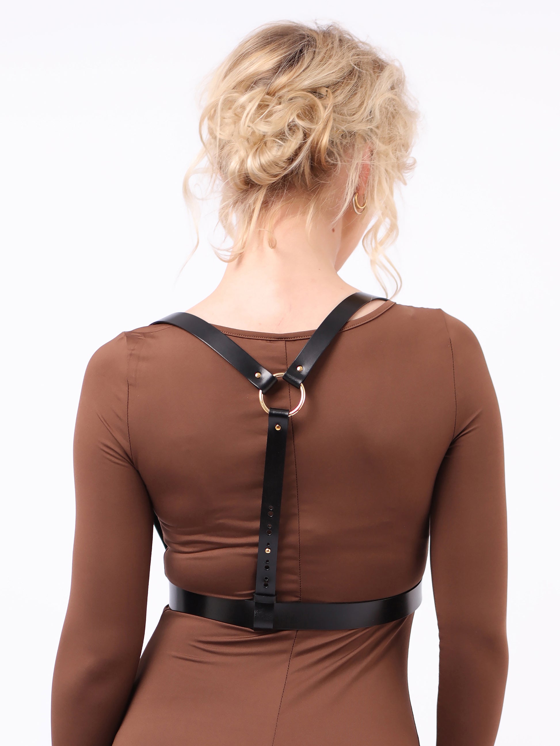 Back view of black leather pocket harness.