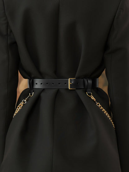 Back view of black leather waist belt with gold chain detail for women.