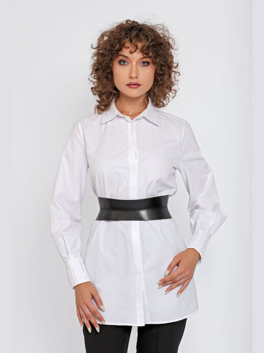 Front view of black leather corset belt being worn over white shirt.