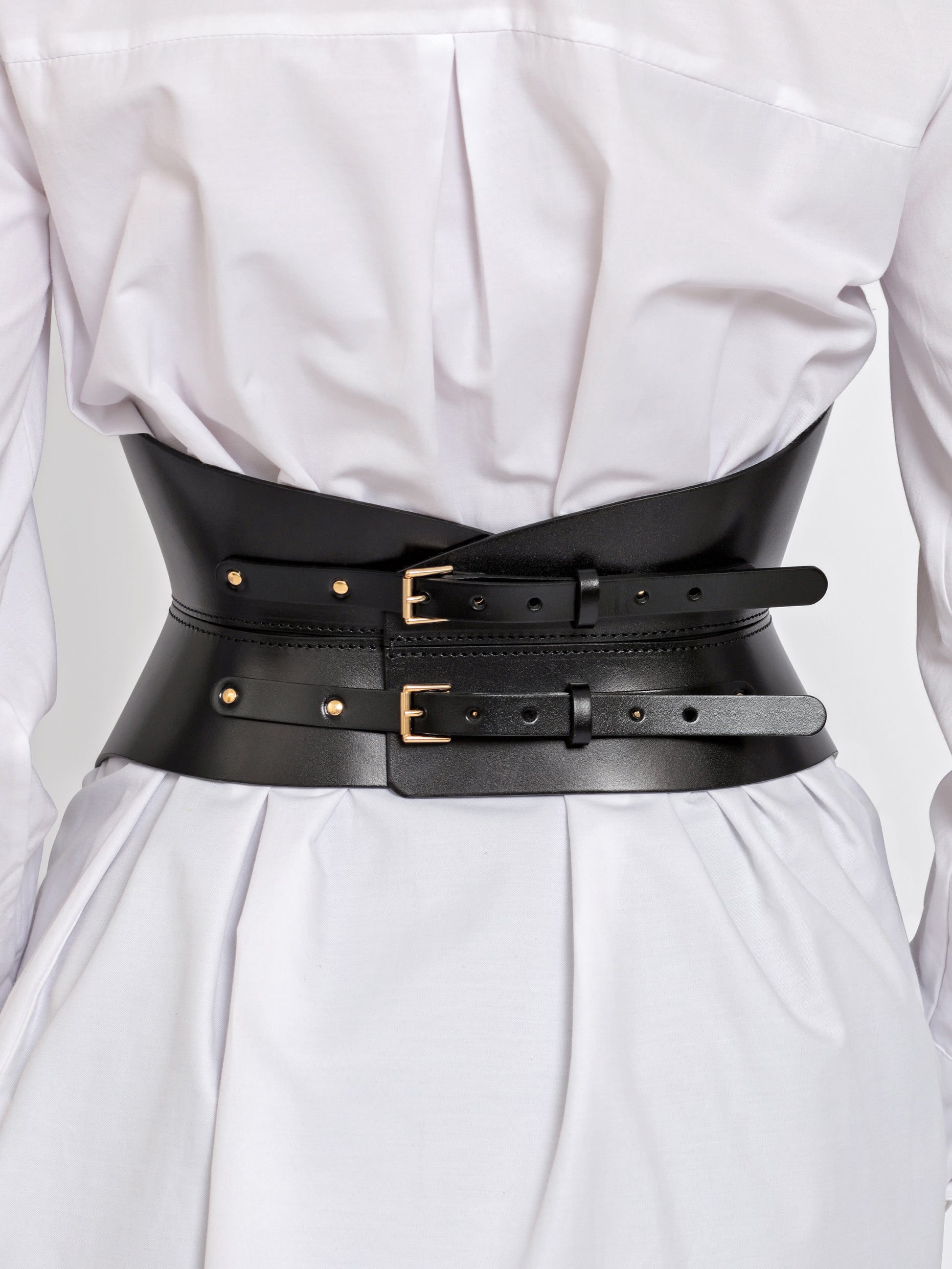Back view of black leather belt.