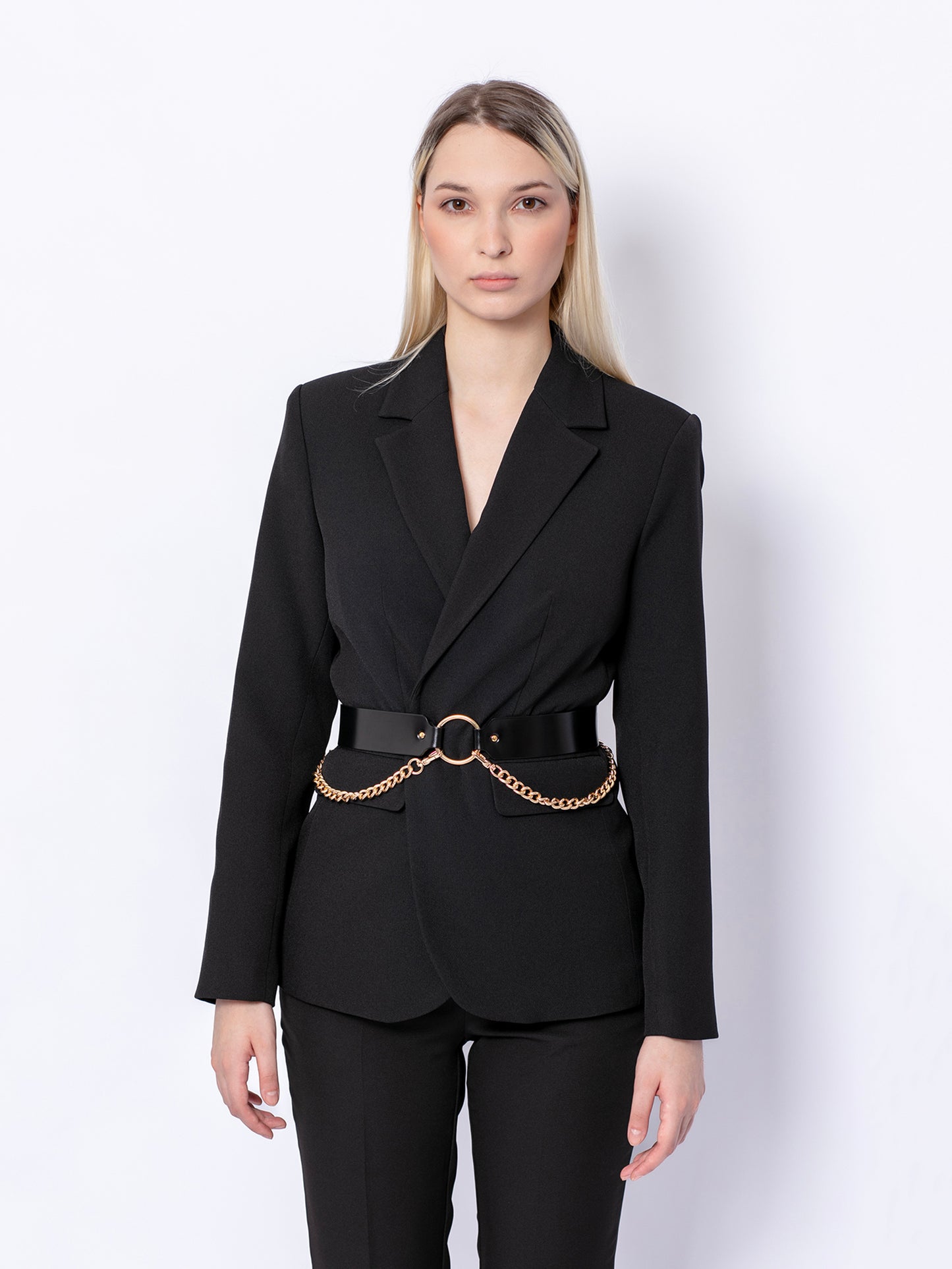 Front view of double chain leather belt worn over black blazer.