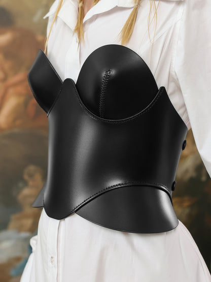 Side close-up of the structured leather corset with curved bust detailing.