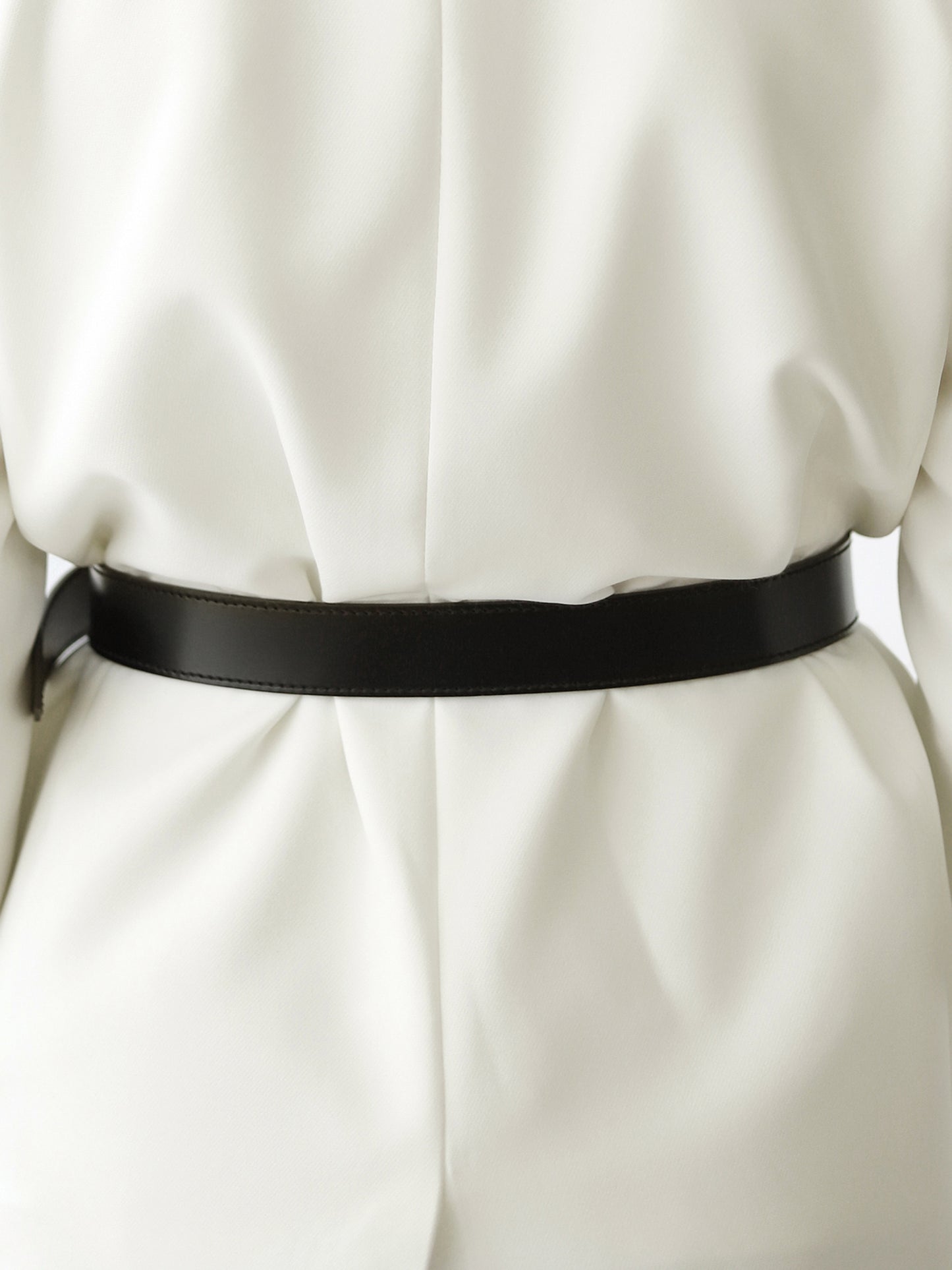 Back view of black leather belt.