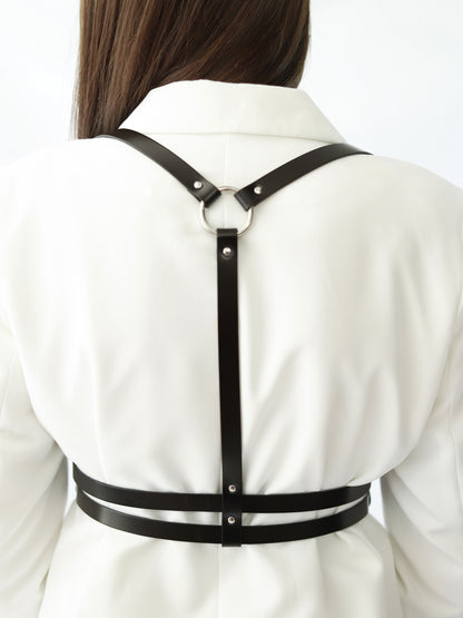 Back view of double belt leather harness.