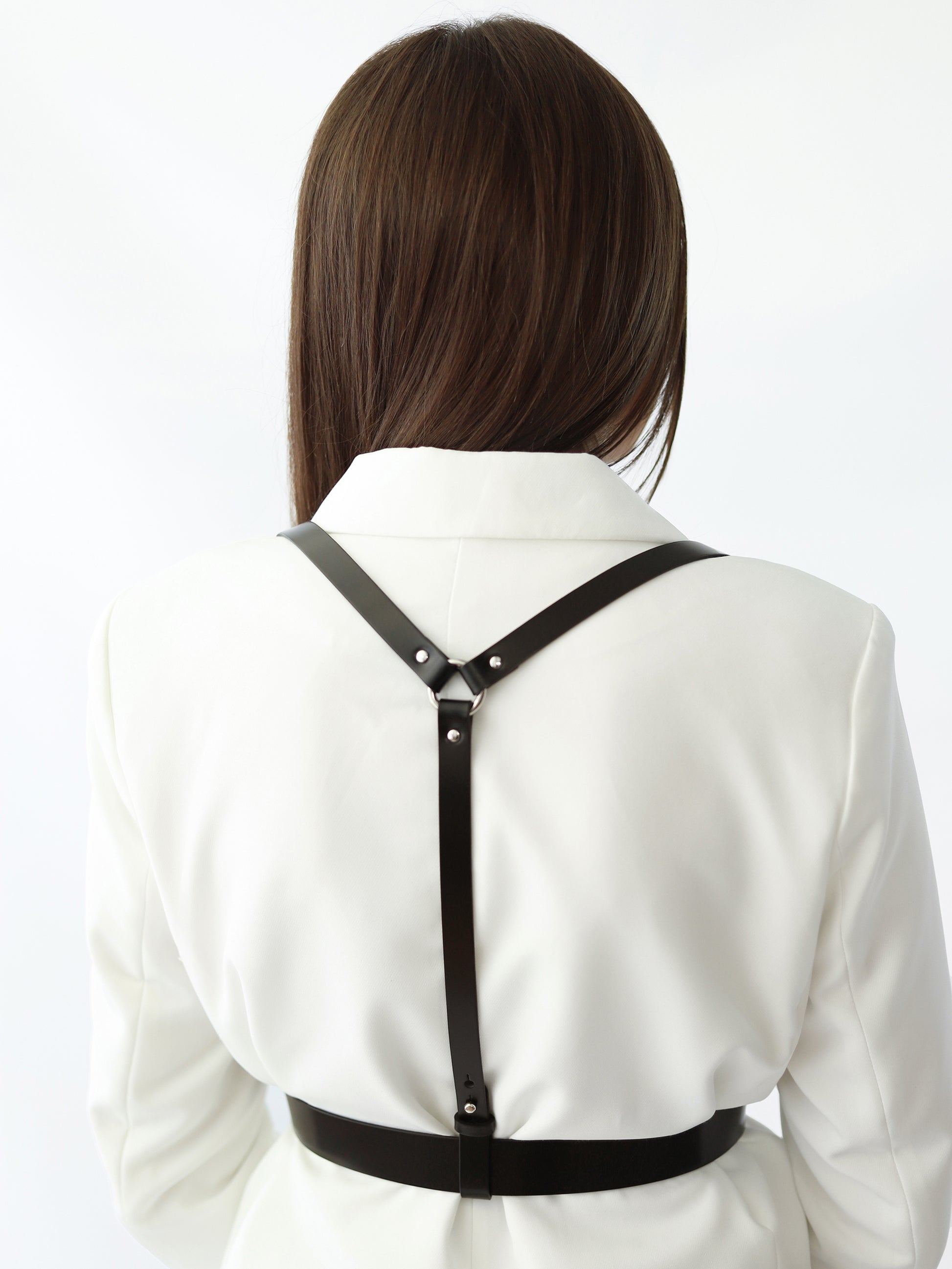 Back view of the leather suspender harness.