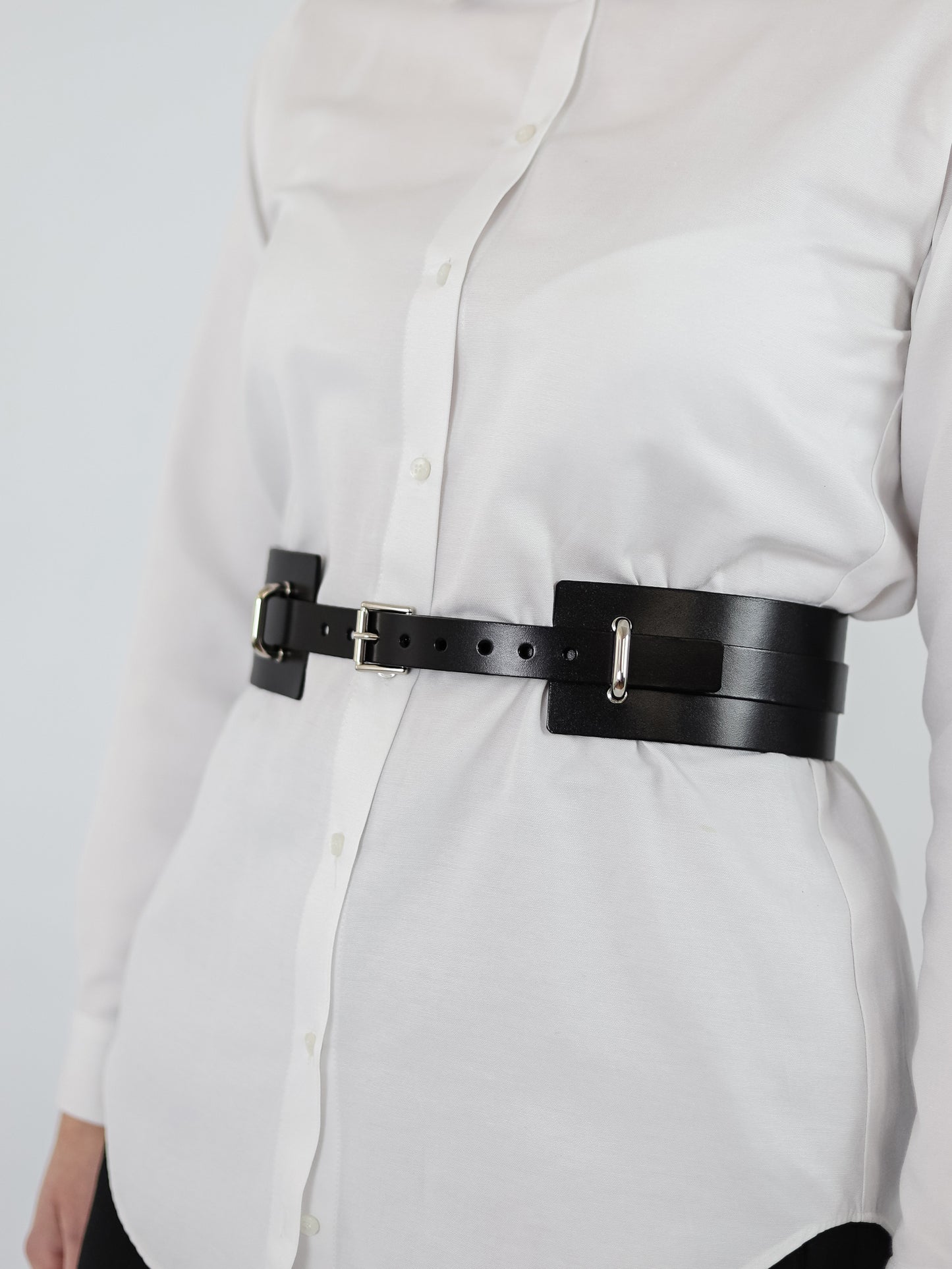 Details of black leather belt