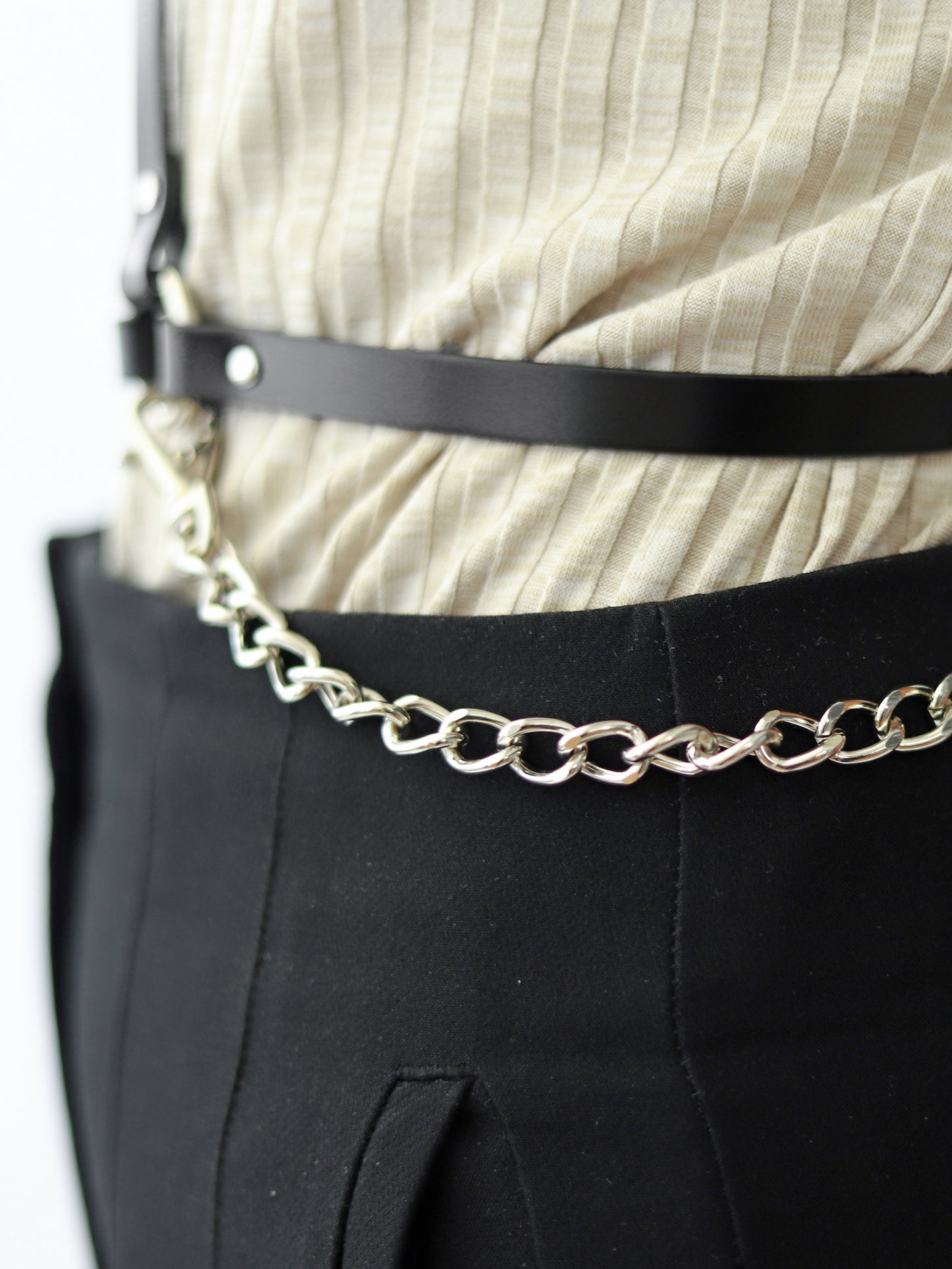 Detail of leather chain harness.