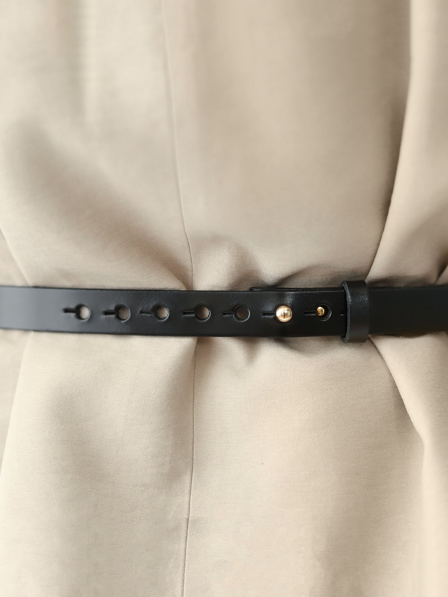 Back view of skinny leather belt.