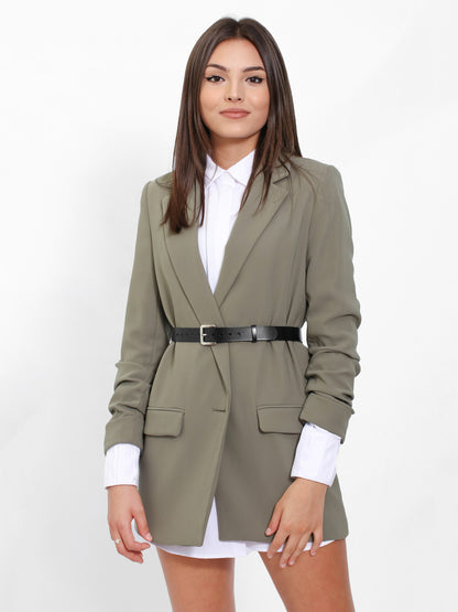 Black leather belt worn with green blazer.
