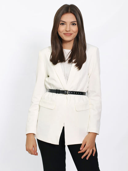 Black slim leather belt worn over white blazer.