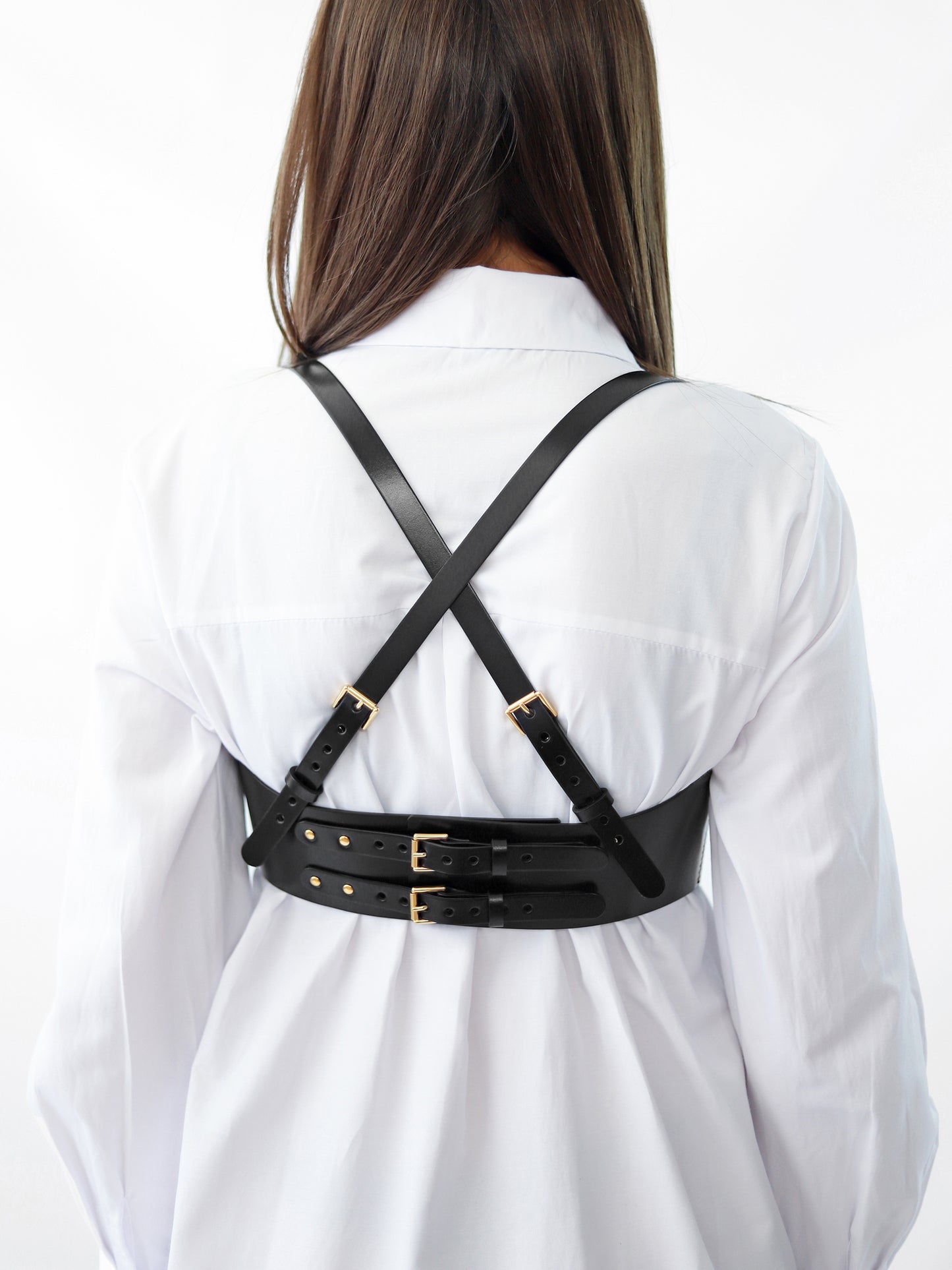 Back view of black underbust corset harness.