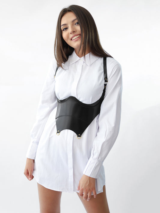Black underbust cupless corset worn with white shirt dress.