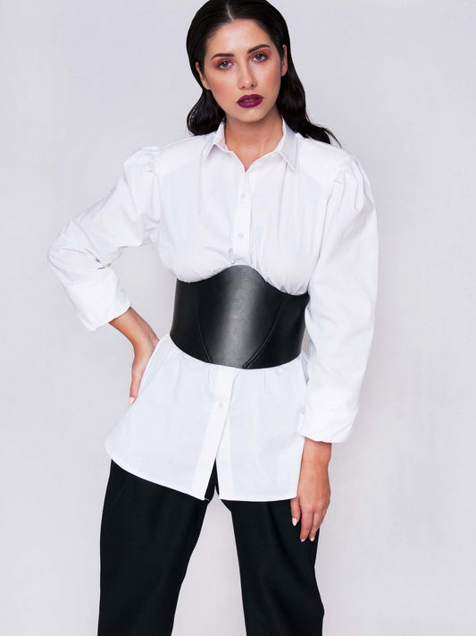 Front view of Leather Underbust Corset worn by woman over white shirt.