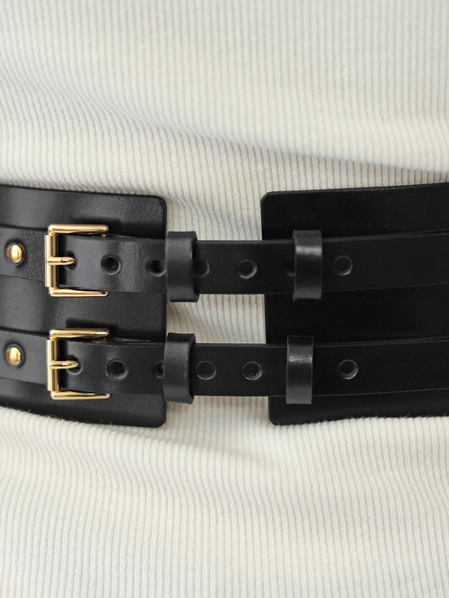 Back detailed view of women wide belt.