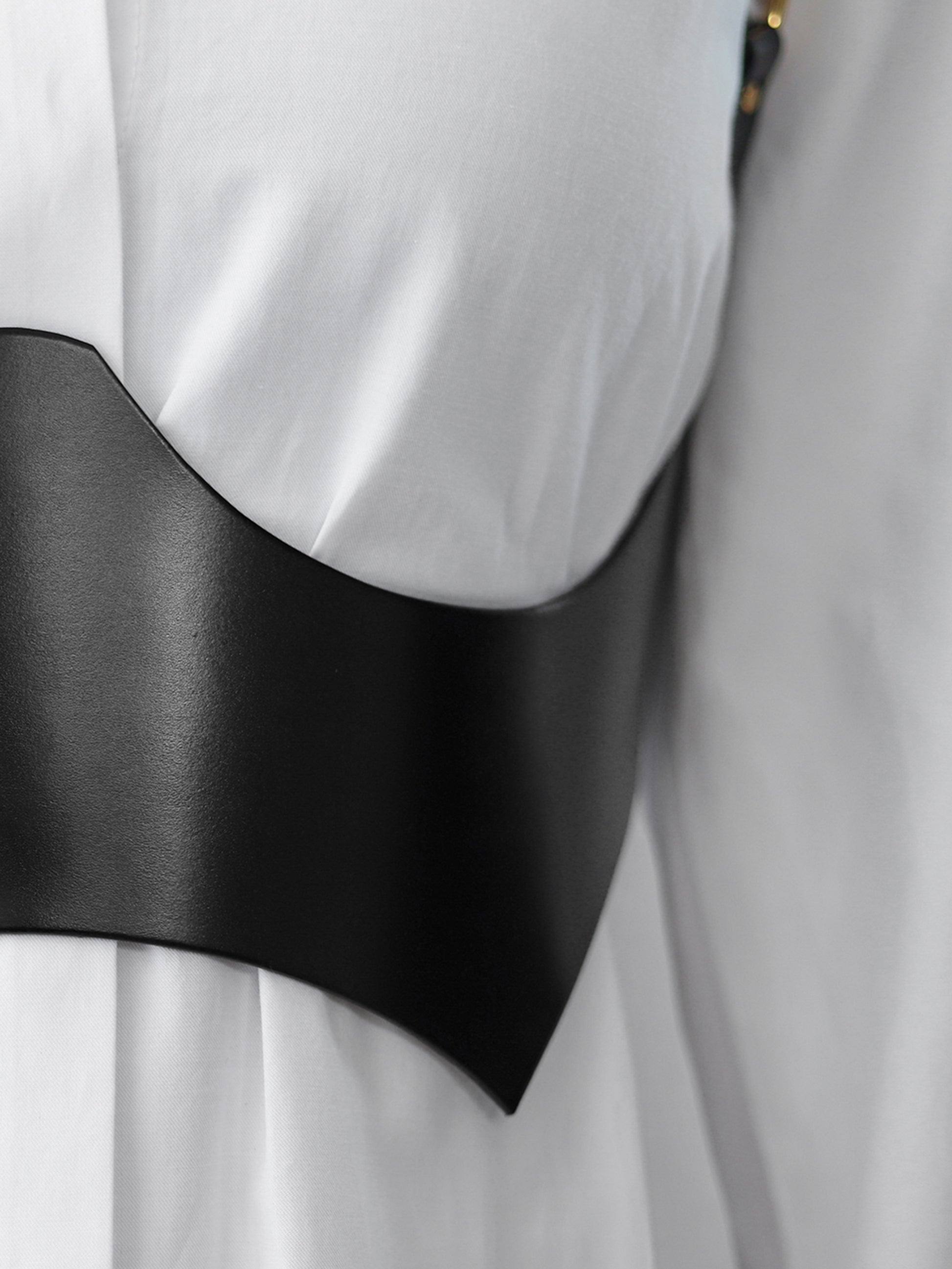Detailed view of underbust corset harness.